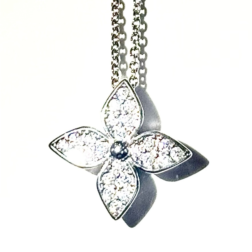 STUNNING Sterling Silver Pendant Necklace. Shiny CZ and elegant, cool design.